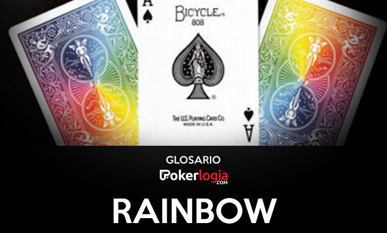 Una as de picas y dos cartas dadas vuelta con motivo de arcoíris con el título "rainbow"